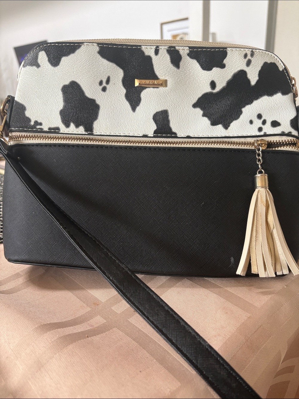 Elim & Paul Black & White Cowhide Accent Crossbody with Tassel